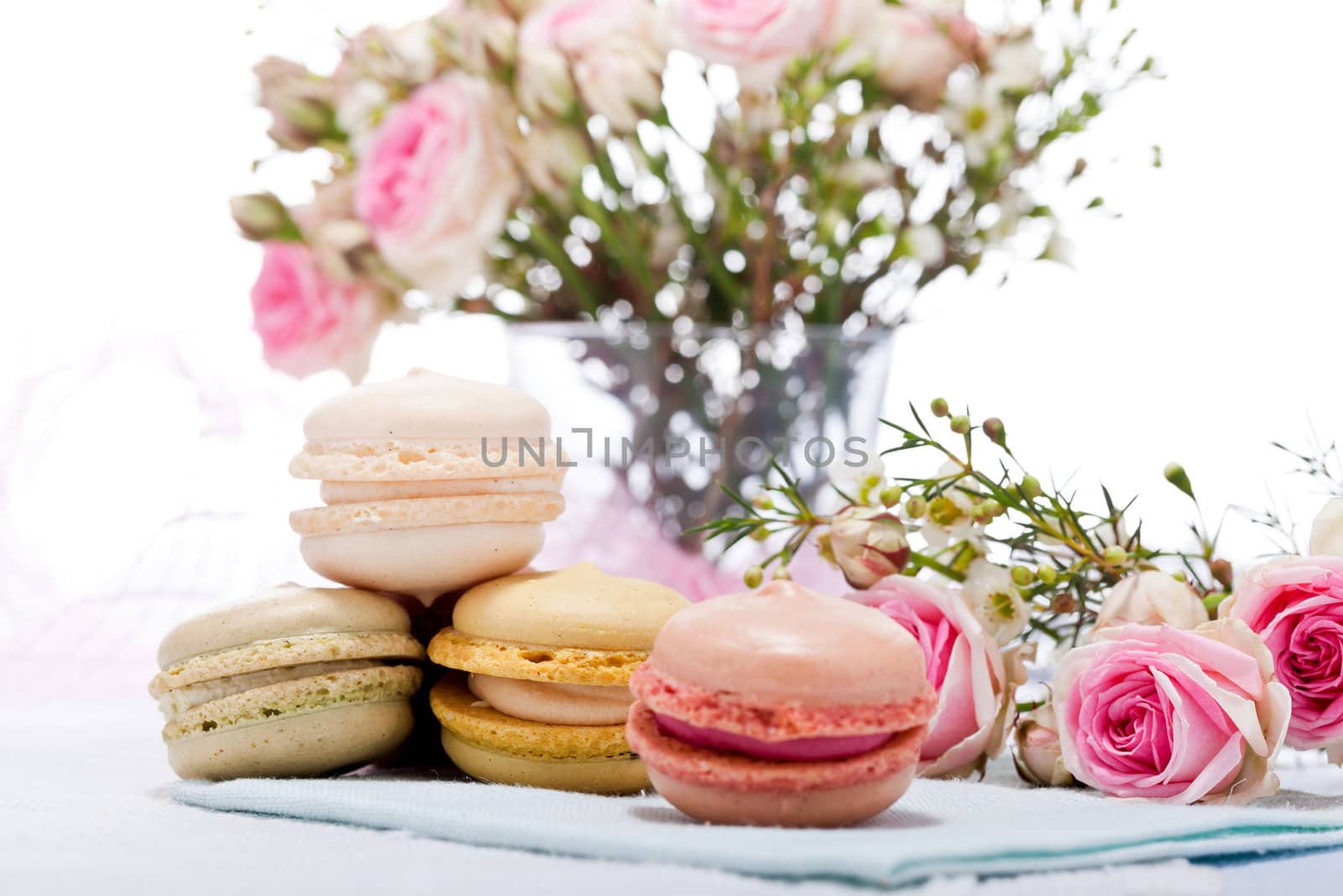 traditional delicious sweet dessert macarons and coffee on table