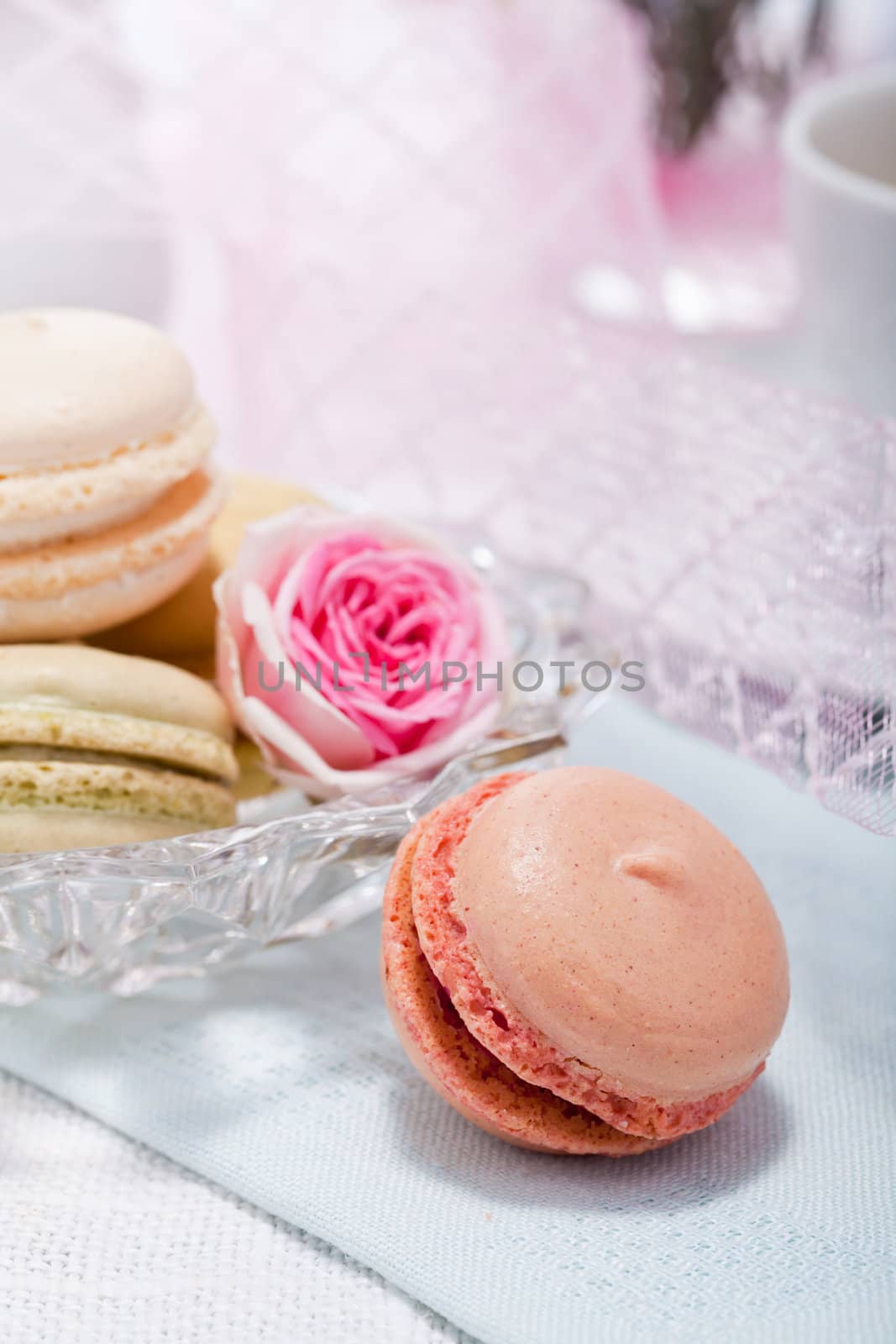 traditional delicious sweet dessert macarons and coffee on table