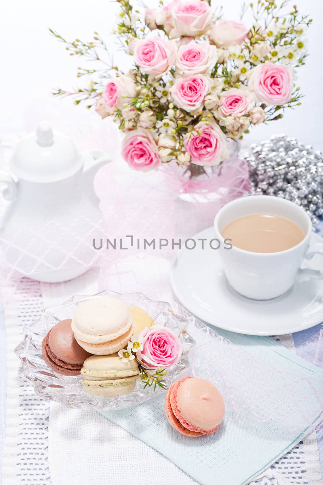 traditional delicious sweet dessert macarons and coffee on table