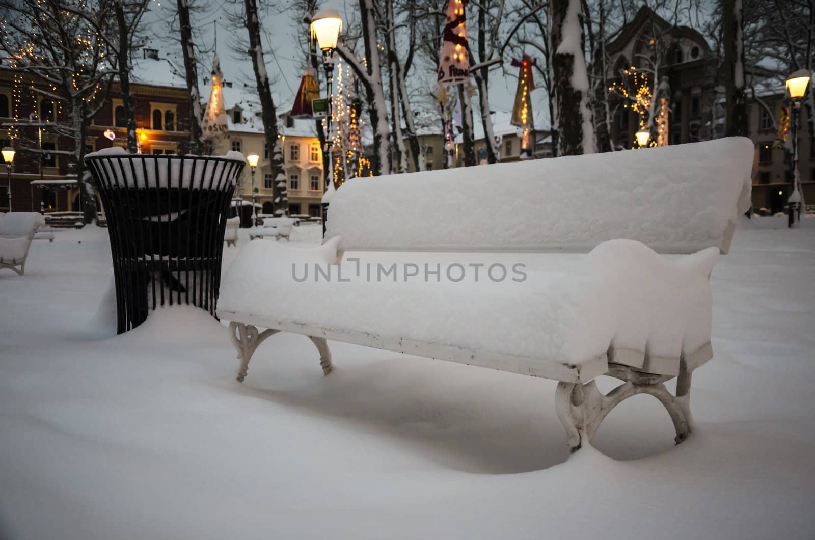 Bench in park cowered with snow in park, Ljubljana (8.12.2012), Slovenia.