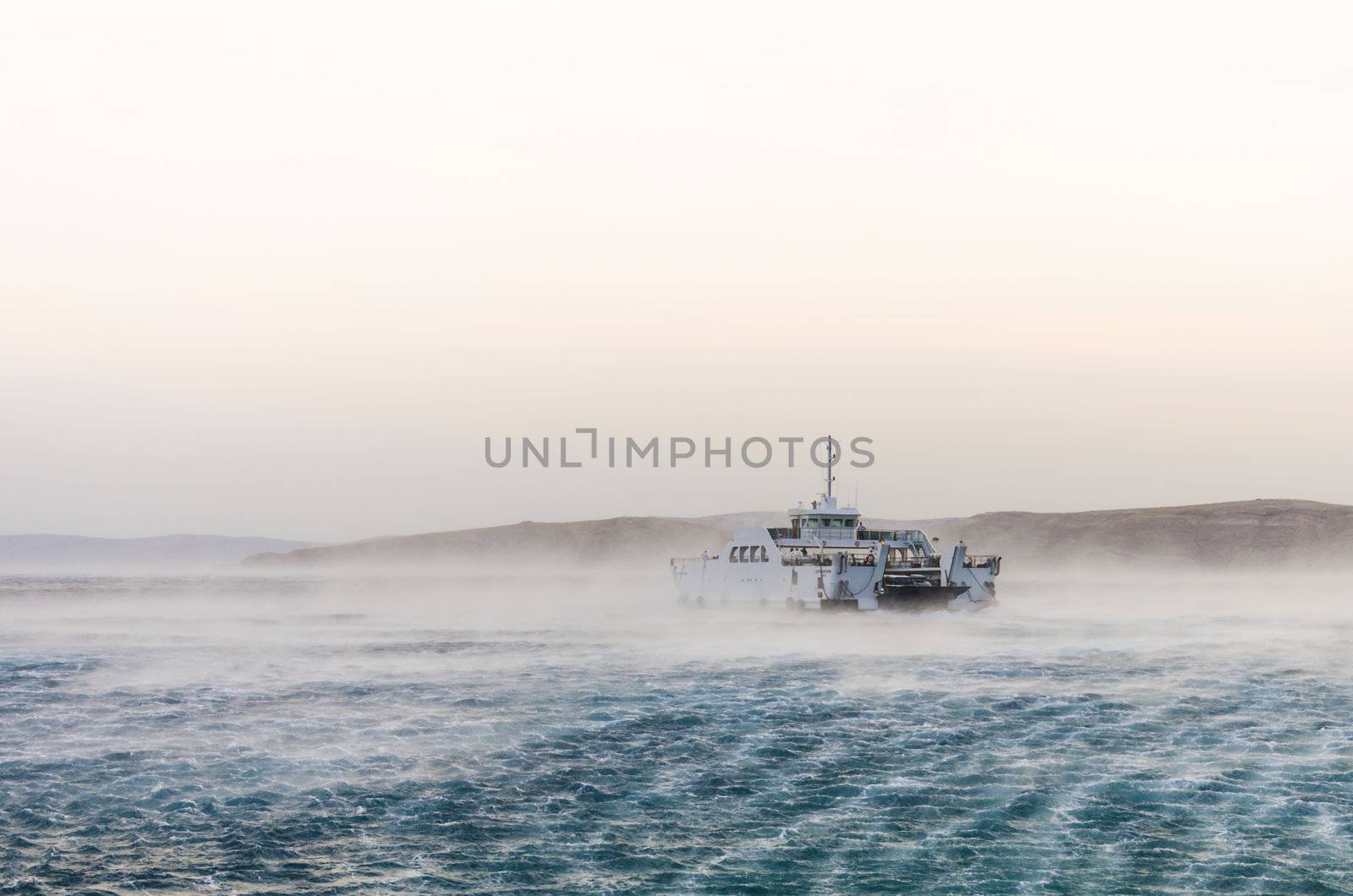 Croatian ferry to island Rab strugling with strong winds.