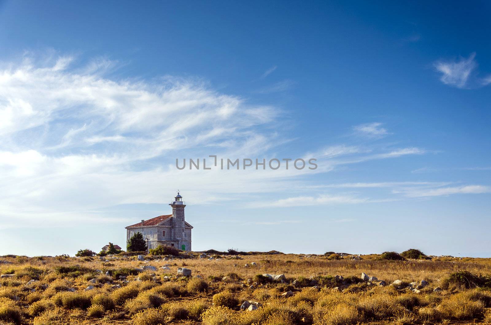 Abandoned lighthouse on a small island in Croatian Kornates, island Trstenik, Croatia.