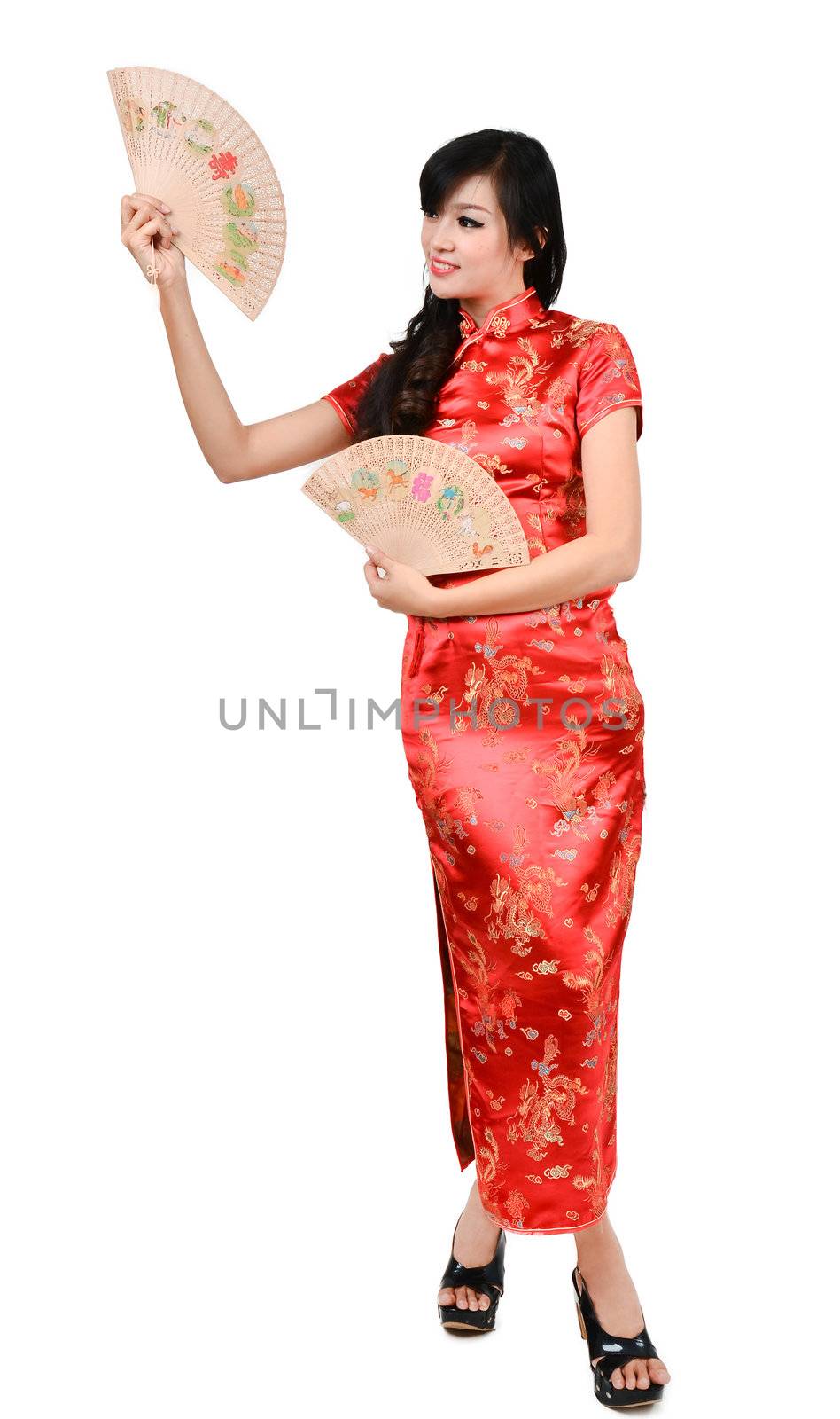 pretty women with Chinese traditional dress Cheongsam and hole Chinese Fan on white background