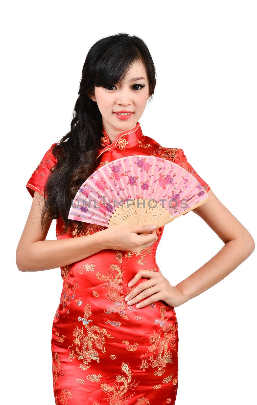 pretty women with Chinese traditional dress Cheongsam and hole Chinese Fan on white background