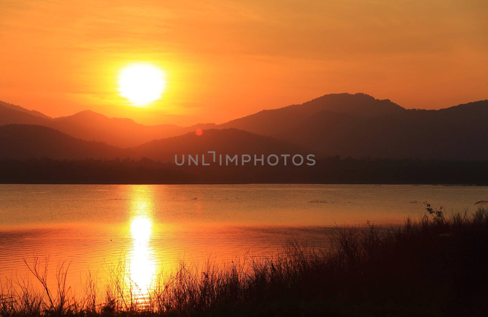 sunset on the lake by rufous