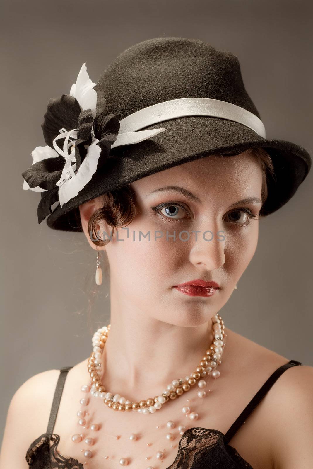 Woman retro revival portrait.girl in hat