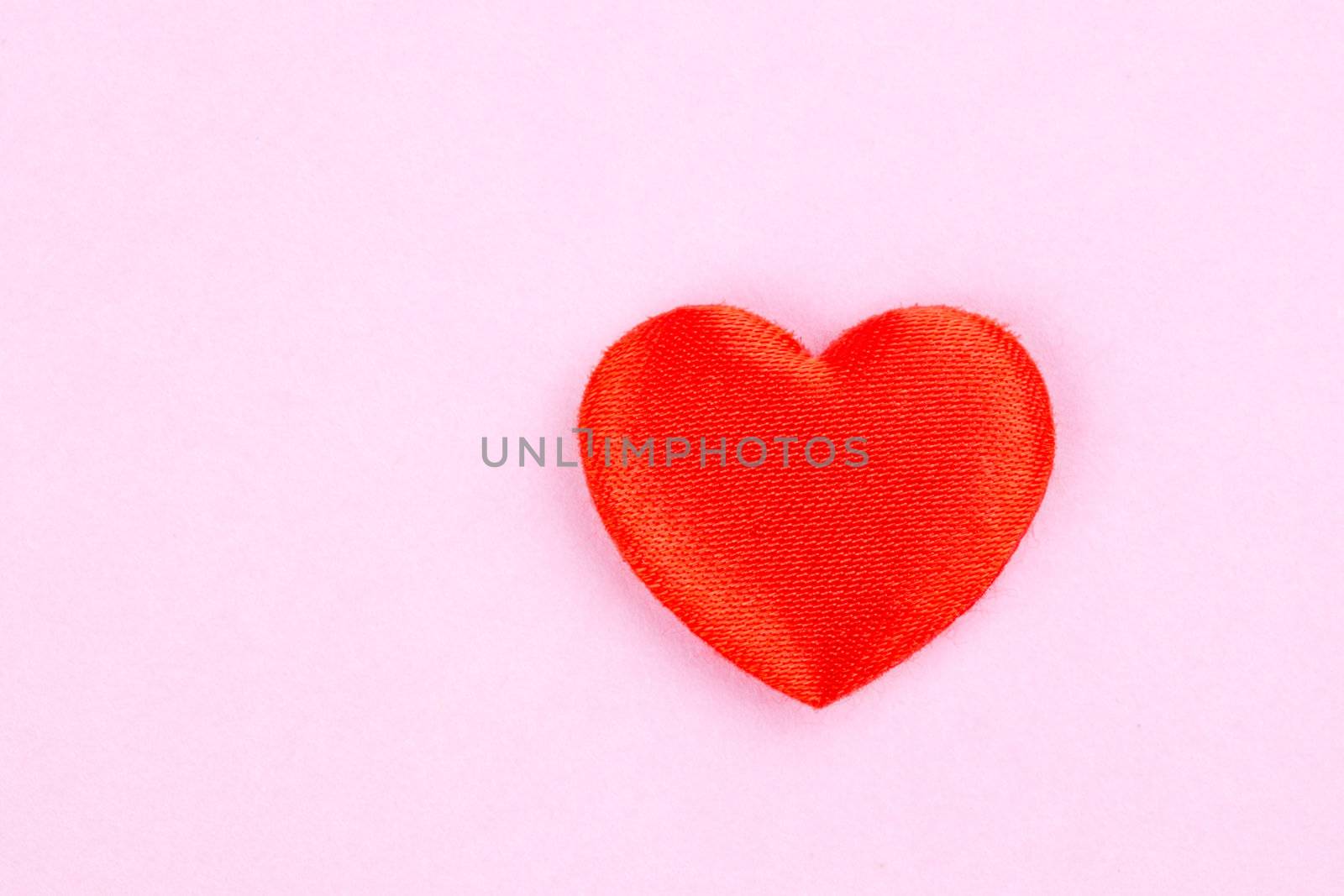 red heart on a pink background