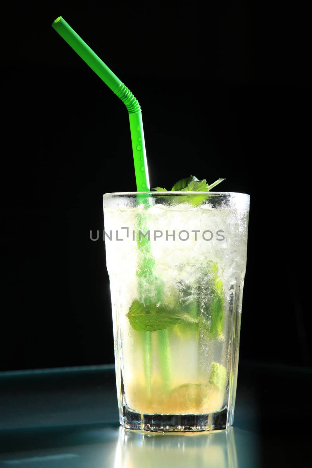 mojito cocktail served on a big glass