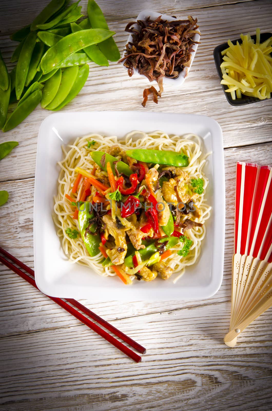 Noodles with pork and vegetables in plum sauce by Darius.Dzinnik