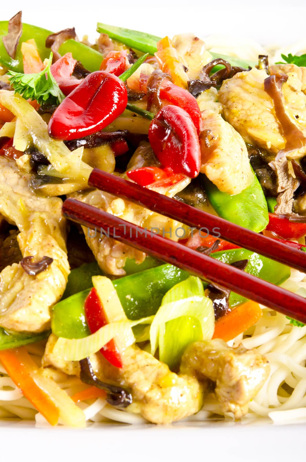 Noodles with pork and vegetables in plum sauce