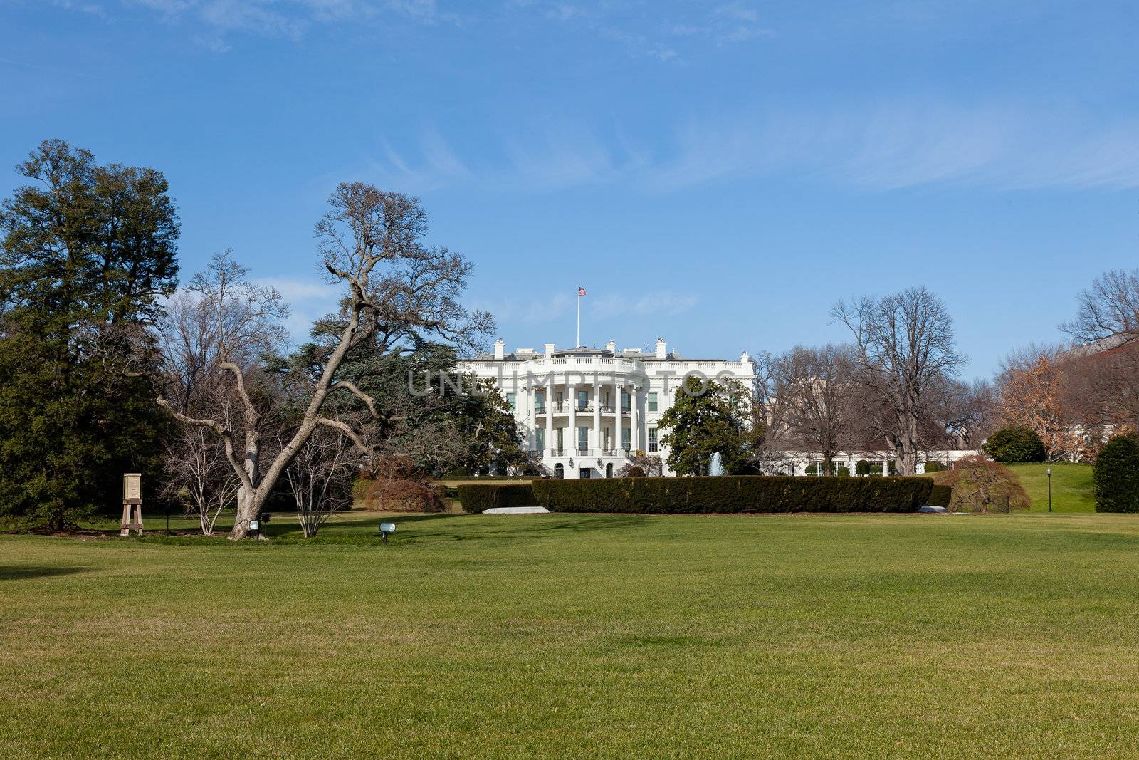 The White House in Washington DC against Blue Sky on Sunny Winter Day