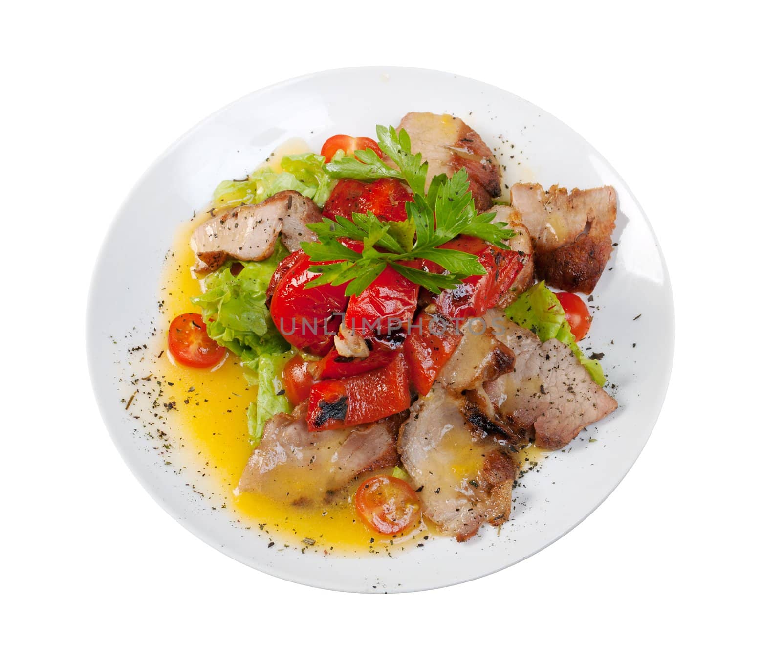 Healthy vegetarian Salad with pork, pepper paprikaon the white plate 