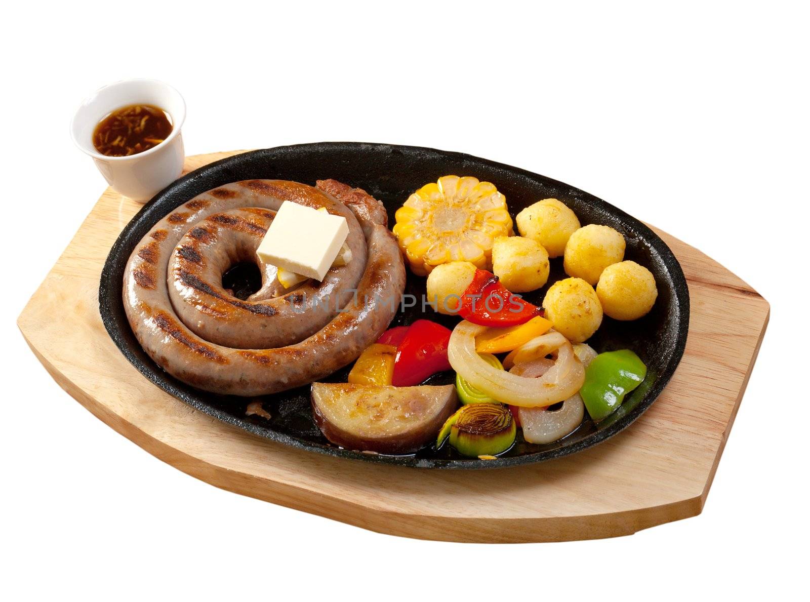 Japanese cuisine .Sausage making roasted with vegetable