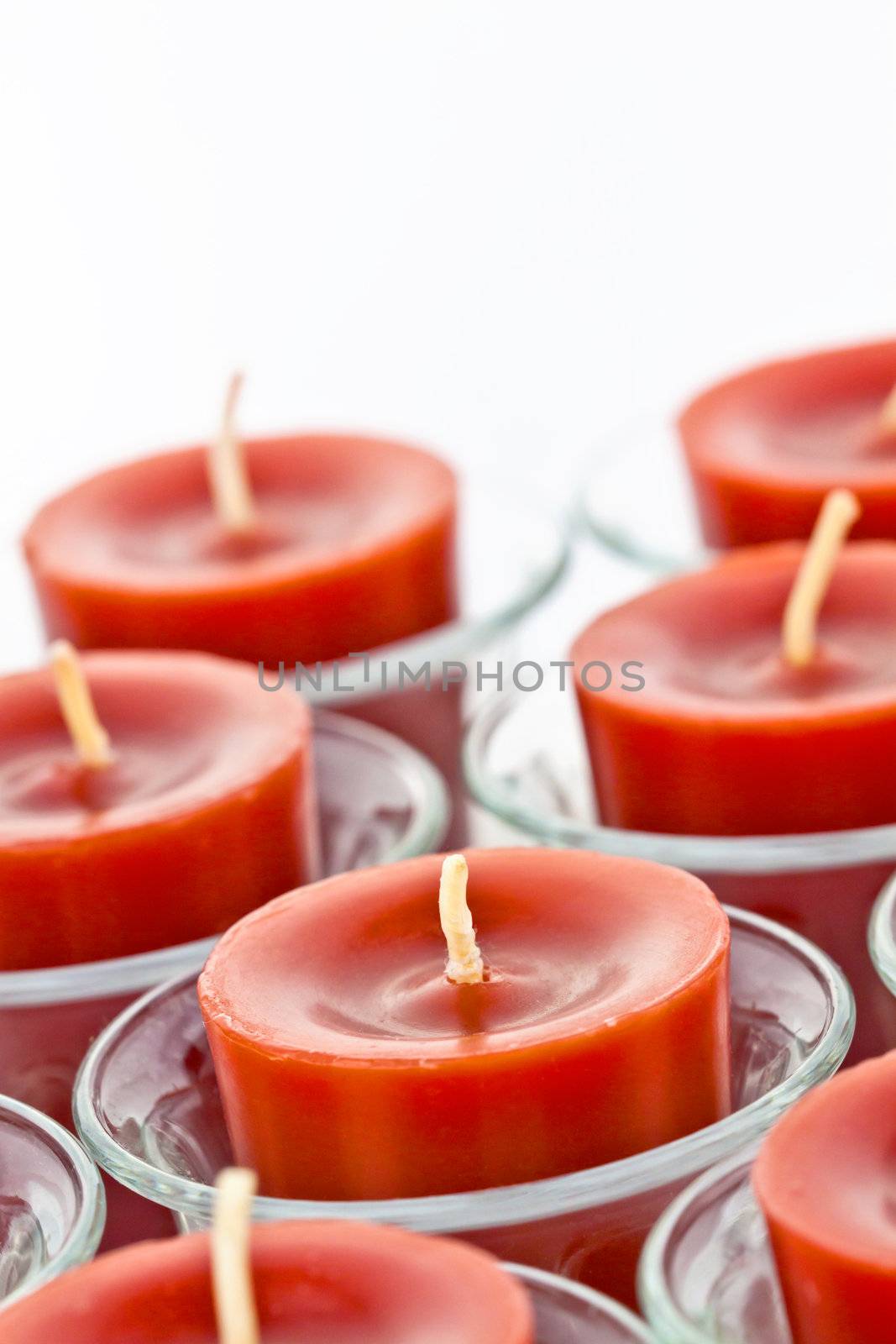 red candles on the glass candle holder