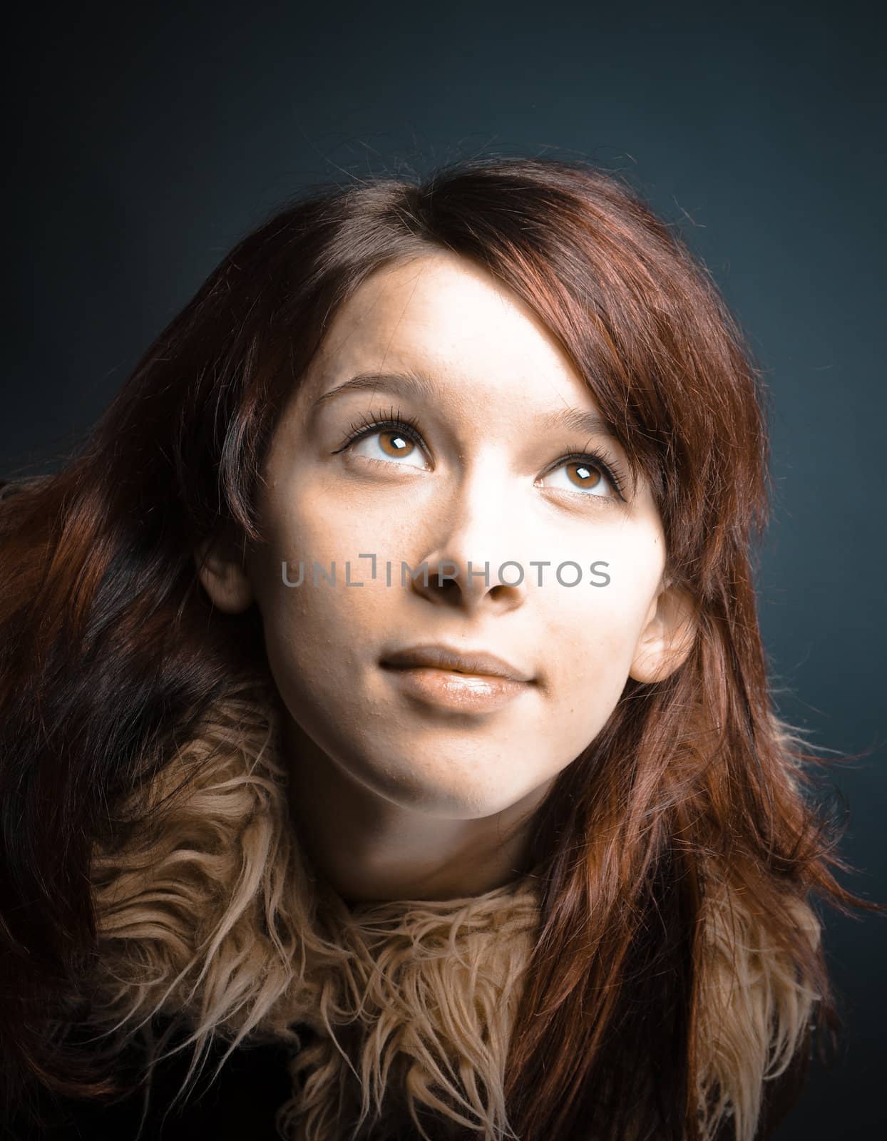 Emo look   girl with red hair on  gray background