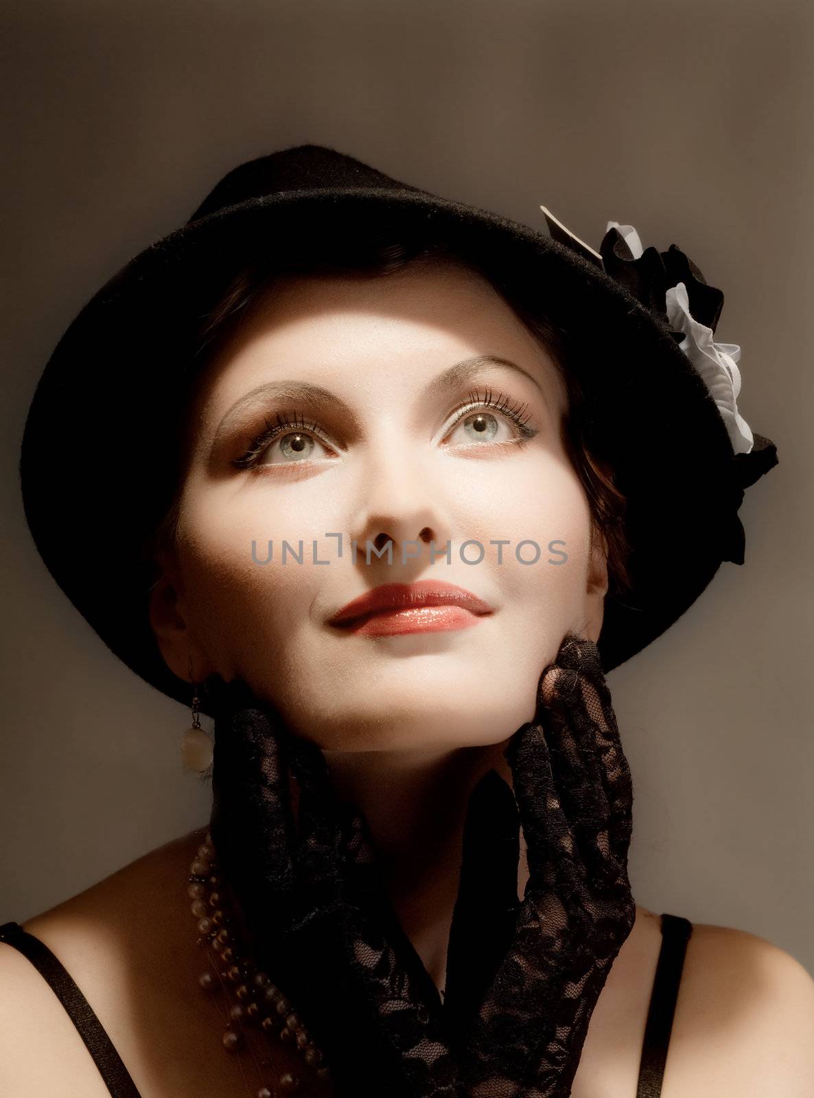 Woman retro revival portrait.girl in hat