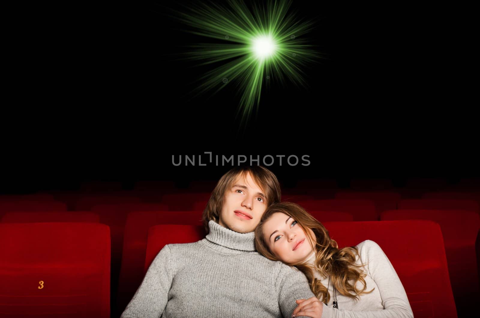 young couple in the cinema by adam121