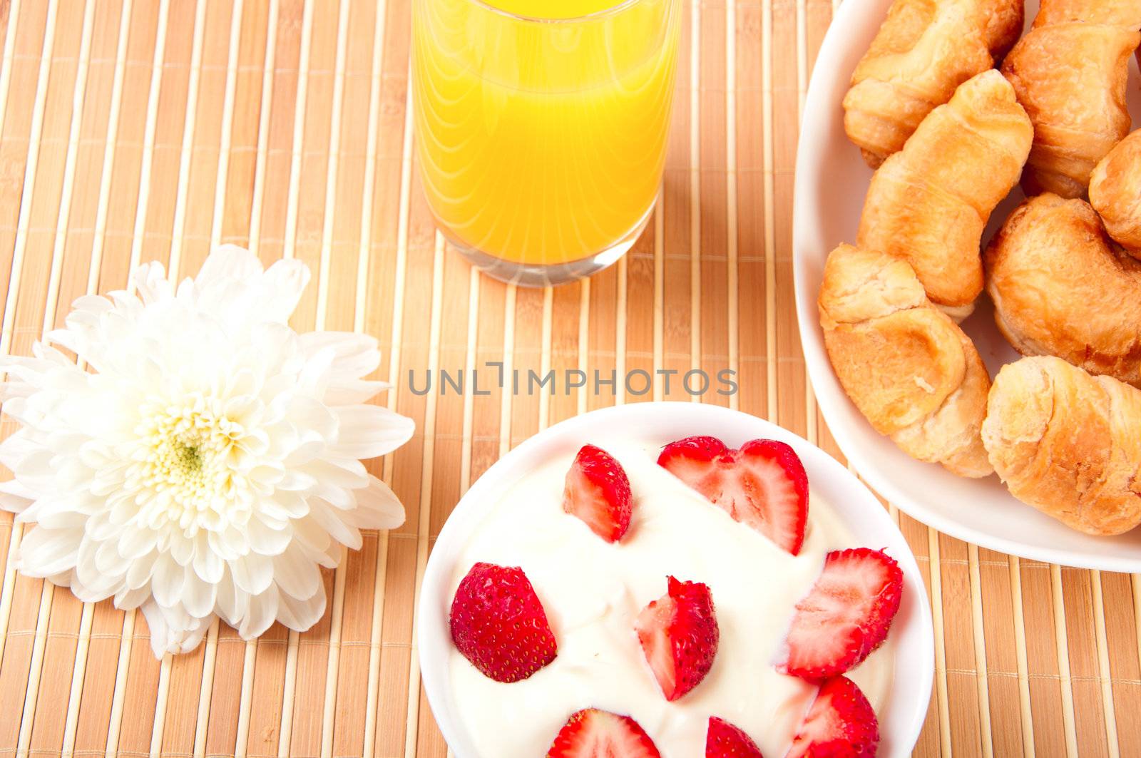 Breakfast with berries,orange juice and croissant, early breakfast