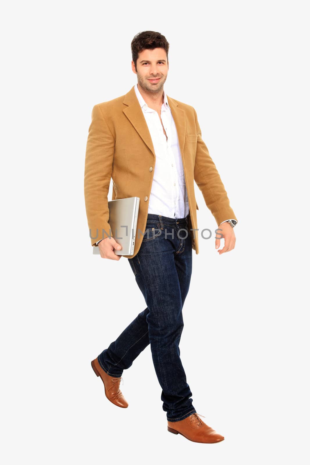 young handsome man holding a laptop isolated on a white background