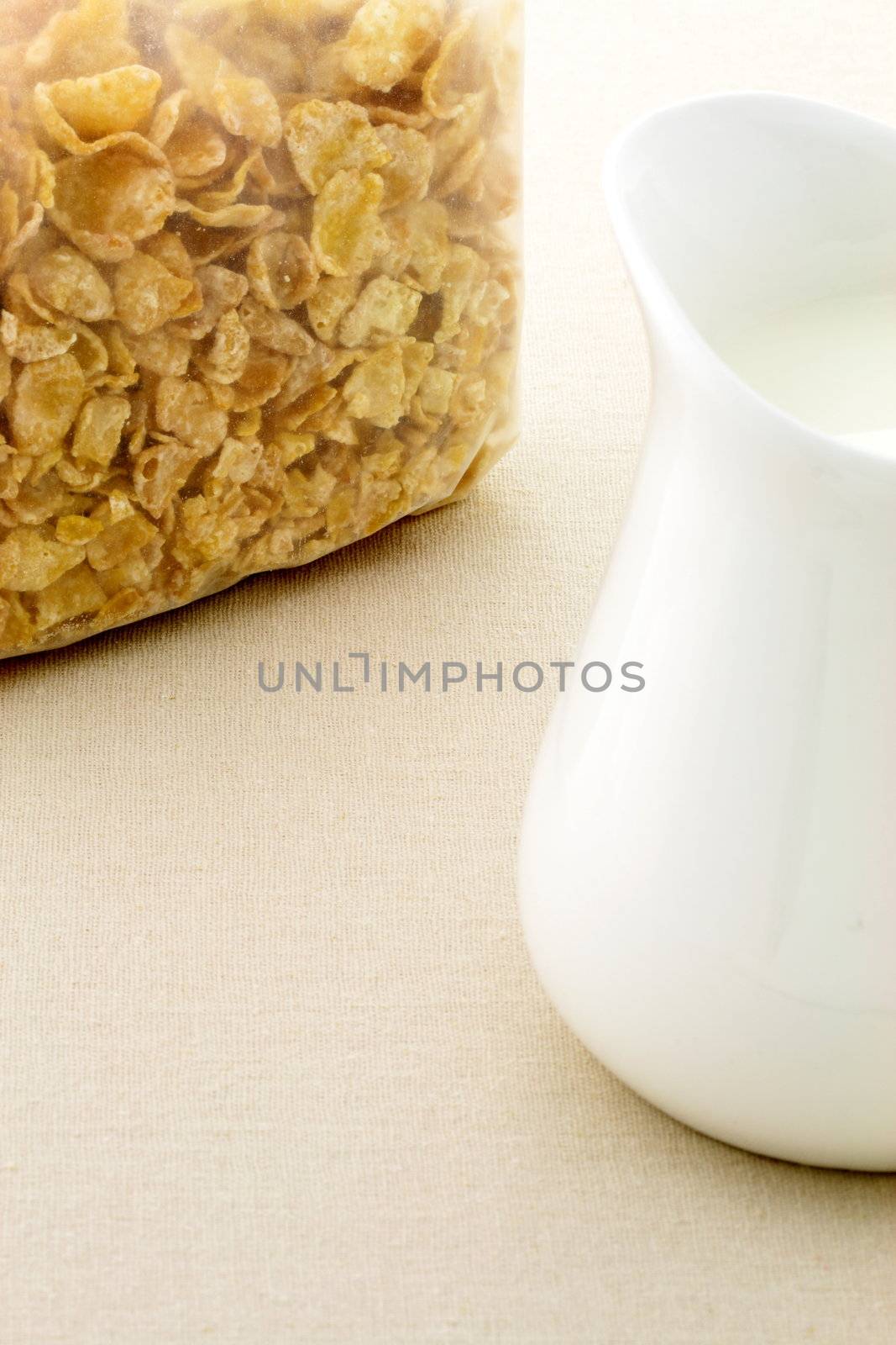 delicious and healthy packed sugar frosted cornflakes and milk jar