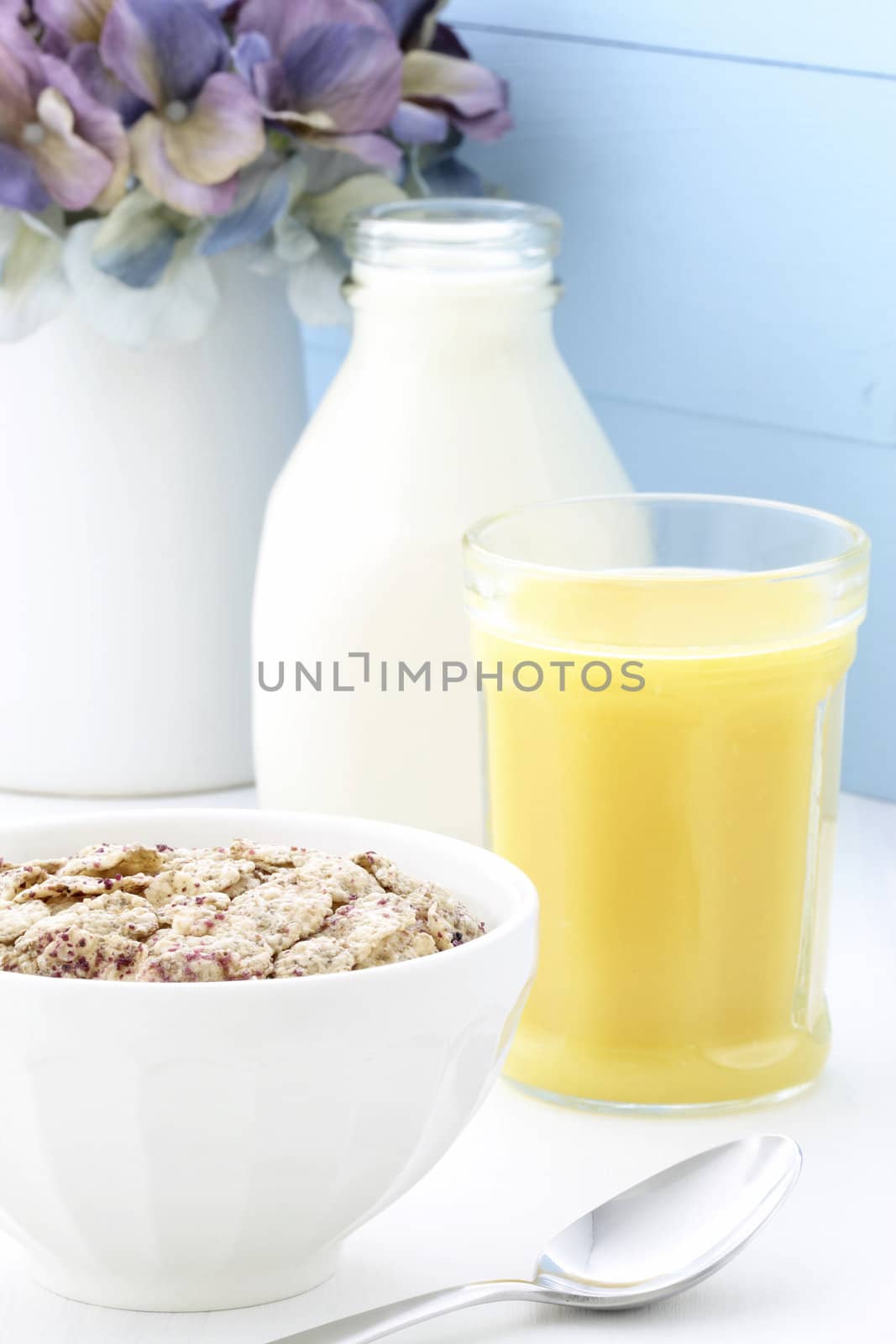 Delicious and healthy breakfast cereal with orange juice
