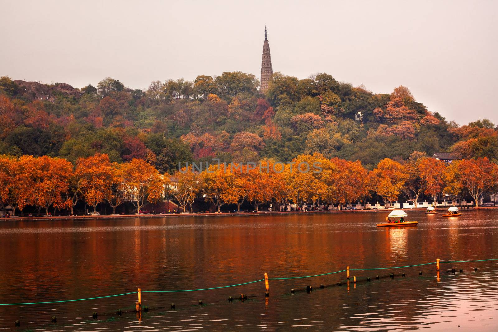 Ancient Baochu Pagoda West Lake Hangzhou Zhejiang China .  Pagoda was constructed in 963AD