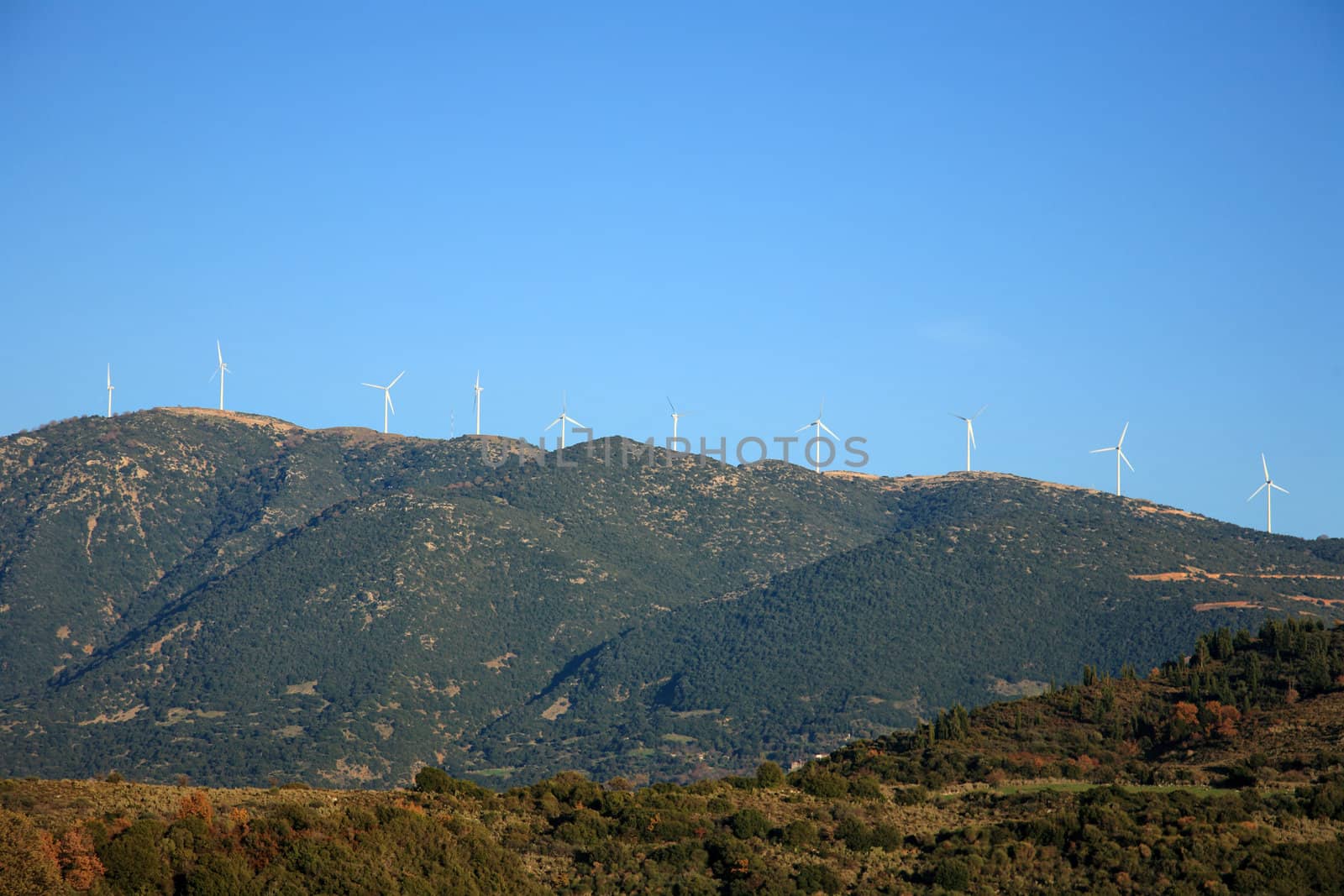 wind turbines on the top of mountains in greece