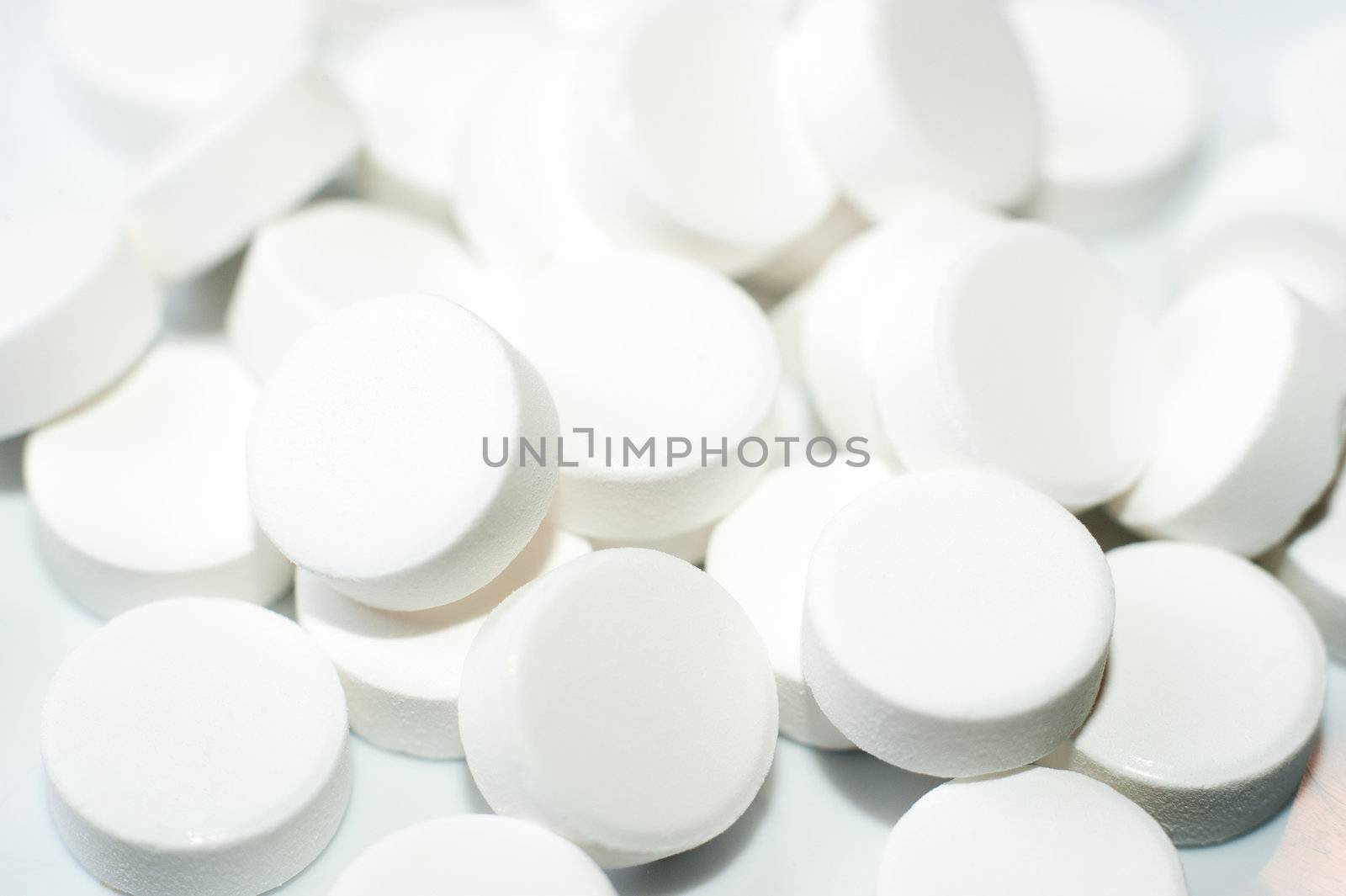 Macro of white pills closeup