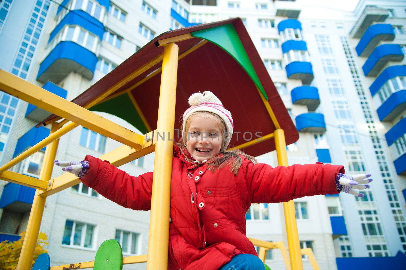 little girl on the playground by GekaSkr