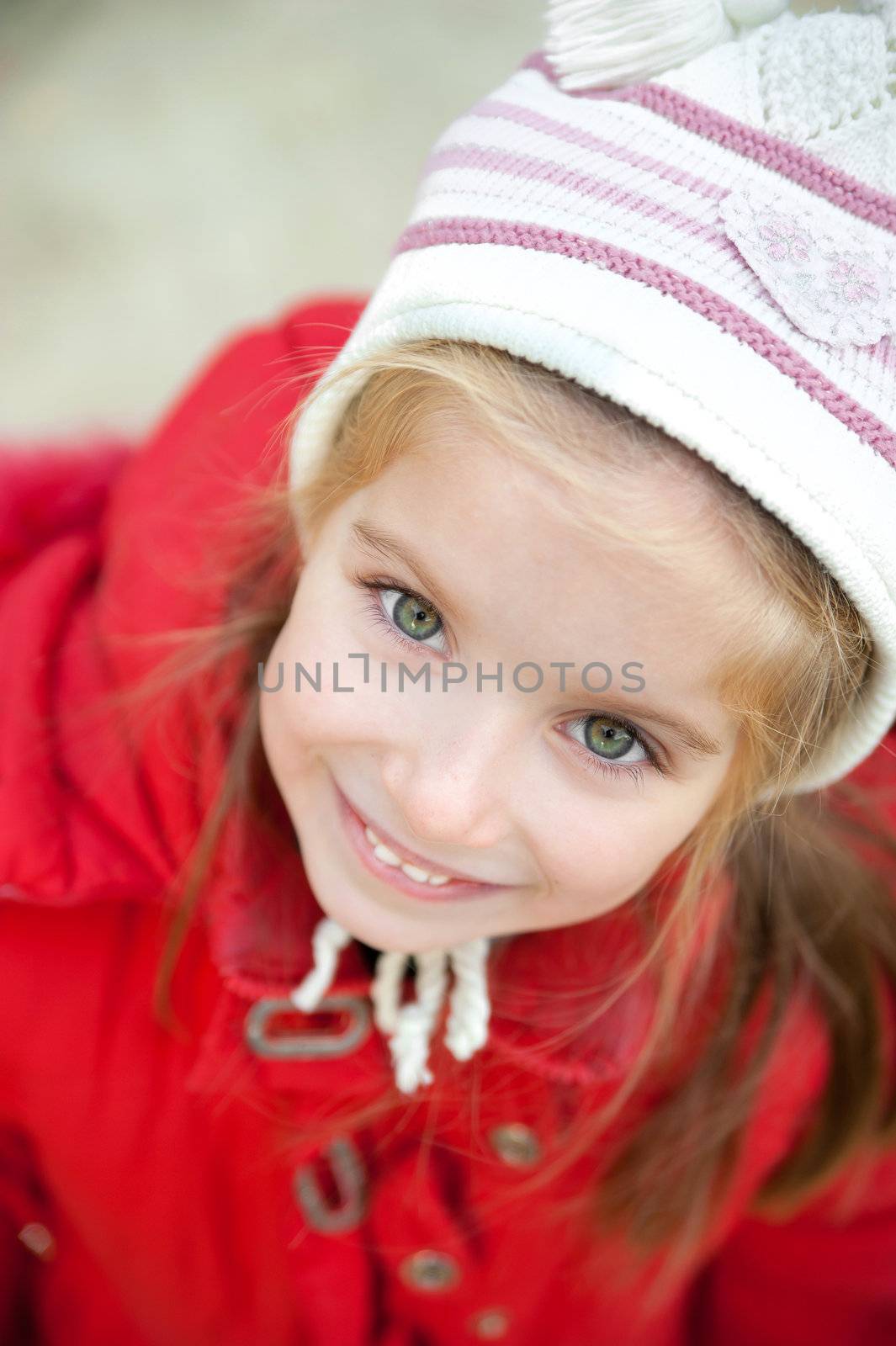 Smiling face of little girl outdoor