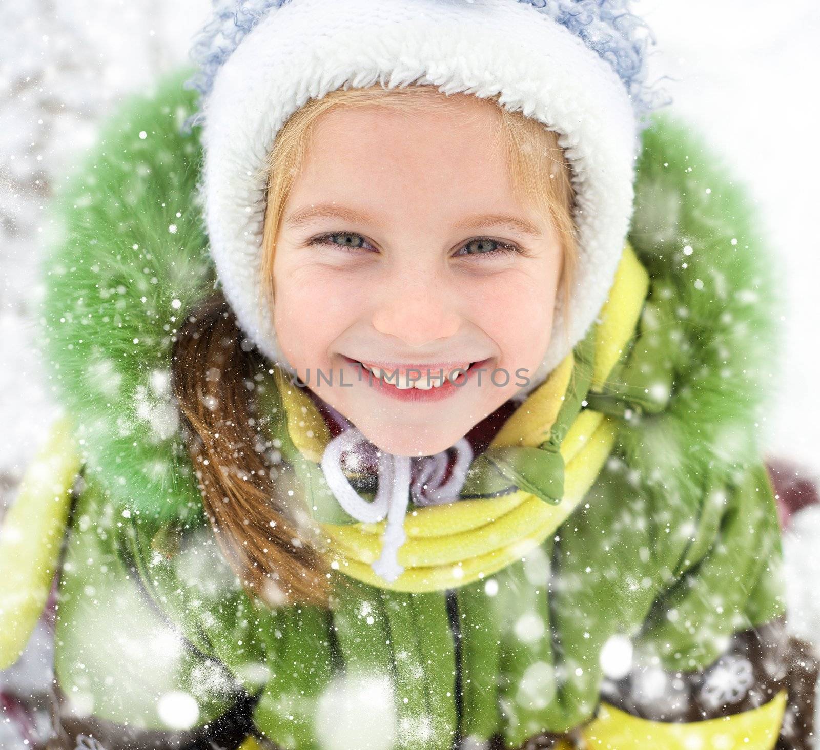 Portrait of happy little girl winter vacation