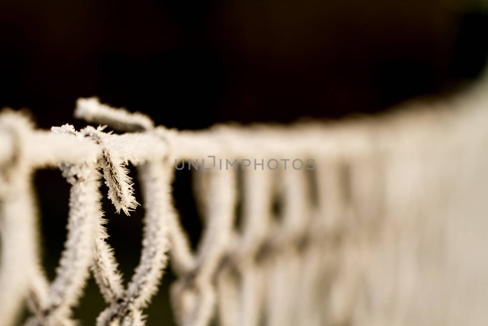 wire fence texture with hoarfrost overlay