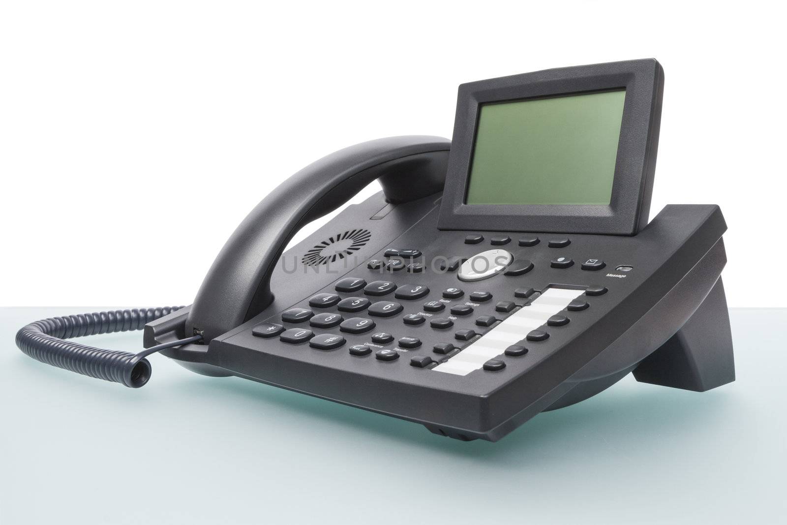 modern voip phone on desk by gewoldi