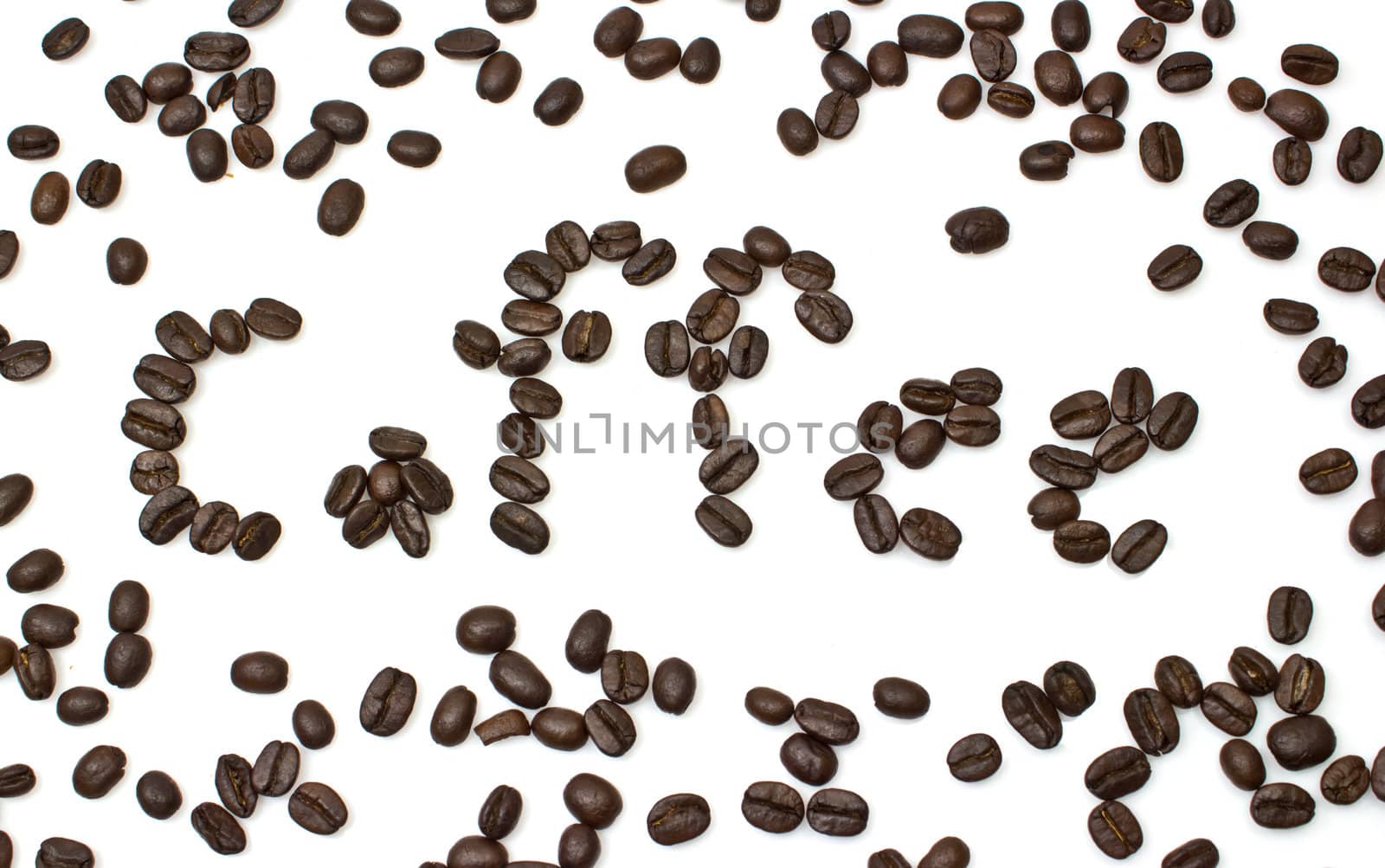 The word of coffee is made of coffee beans is isolated on a white background.