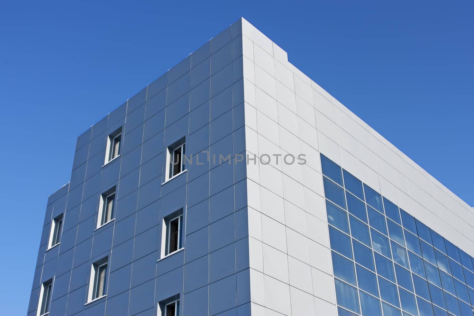 Upper part of the modern office building by qiiip