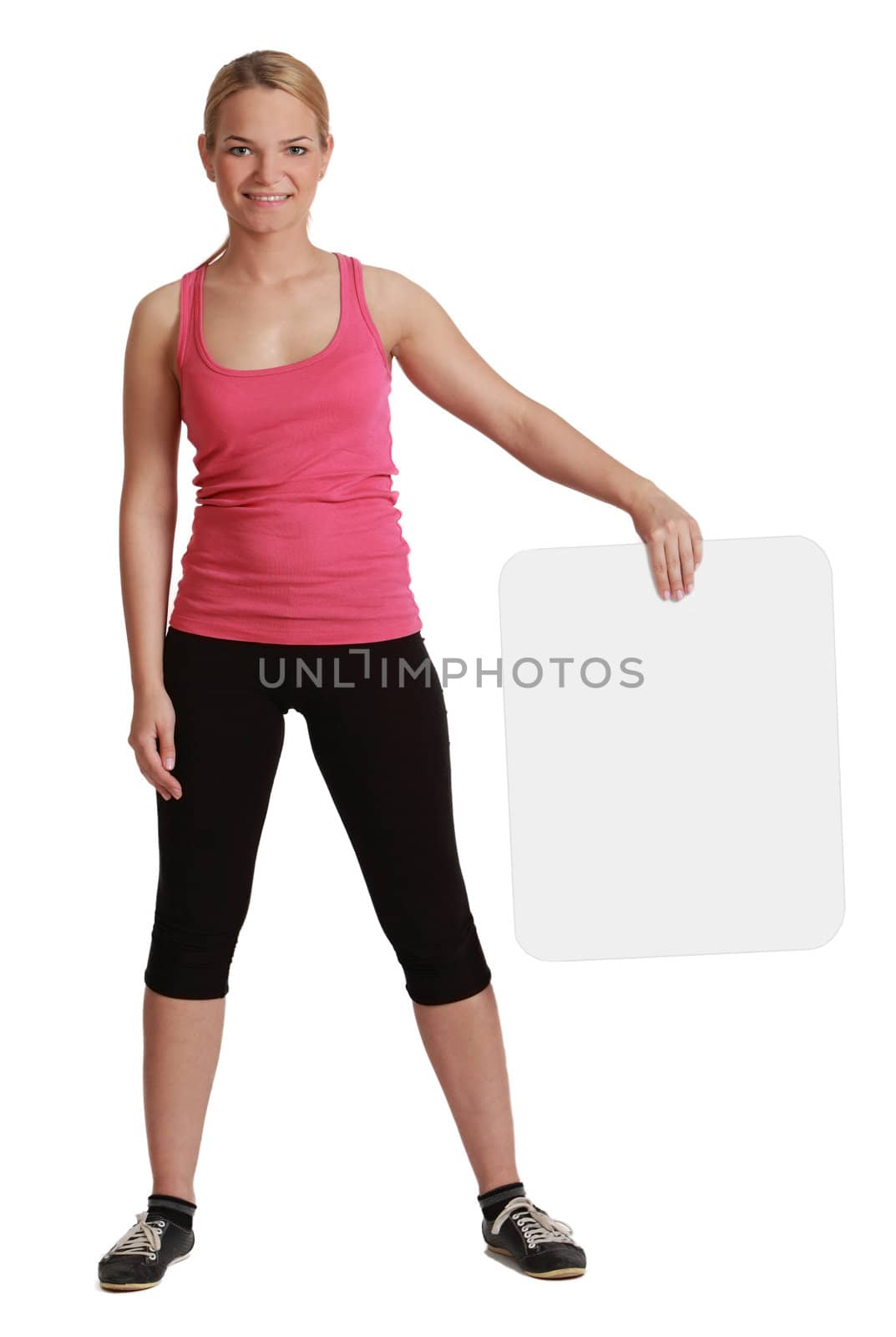 A young woman  holding an empty white bill board against a white background.