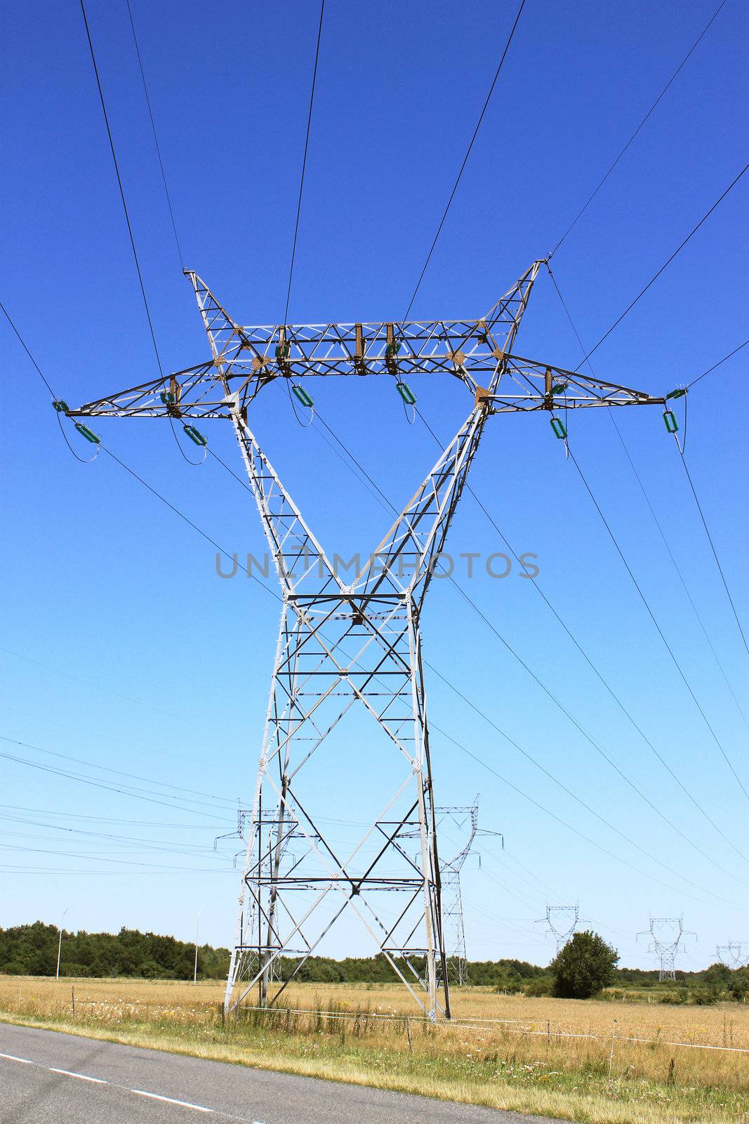 electric pylon in a field or meadow