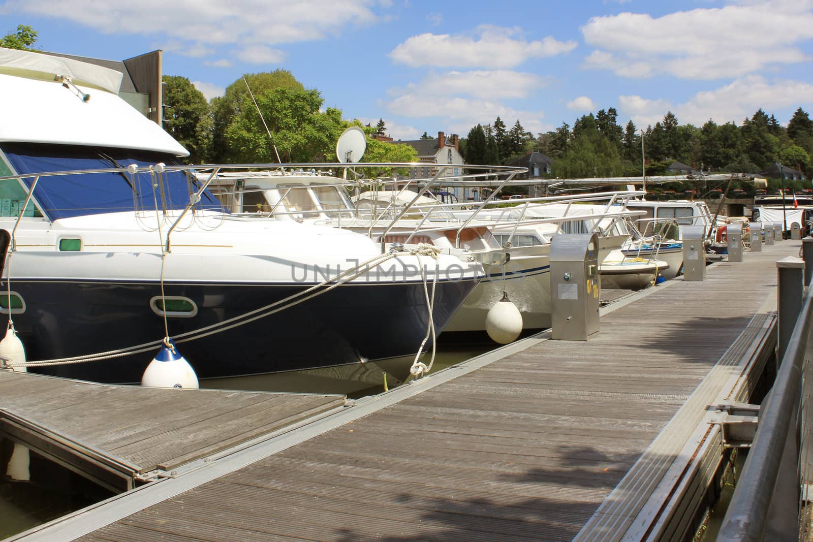 photo of the bow of a pleasure boat in a port