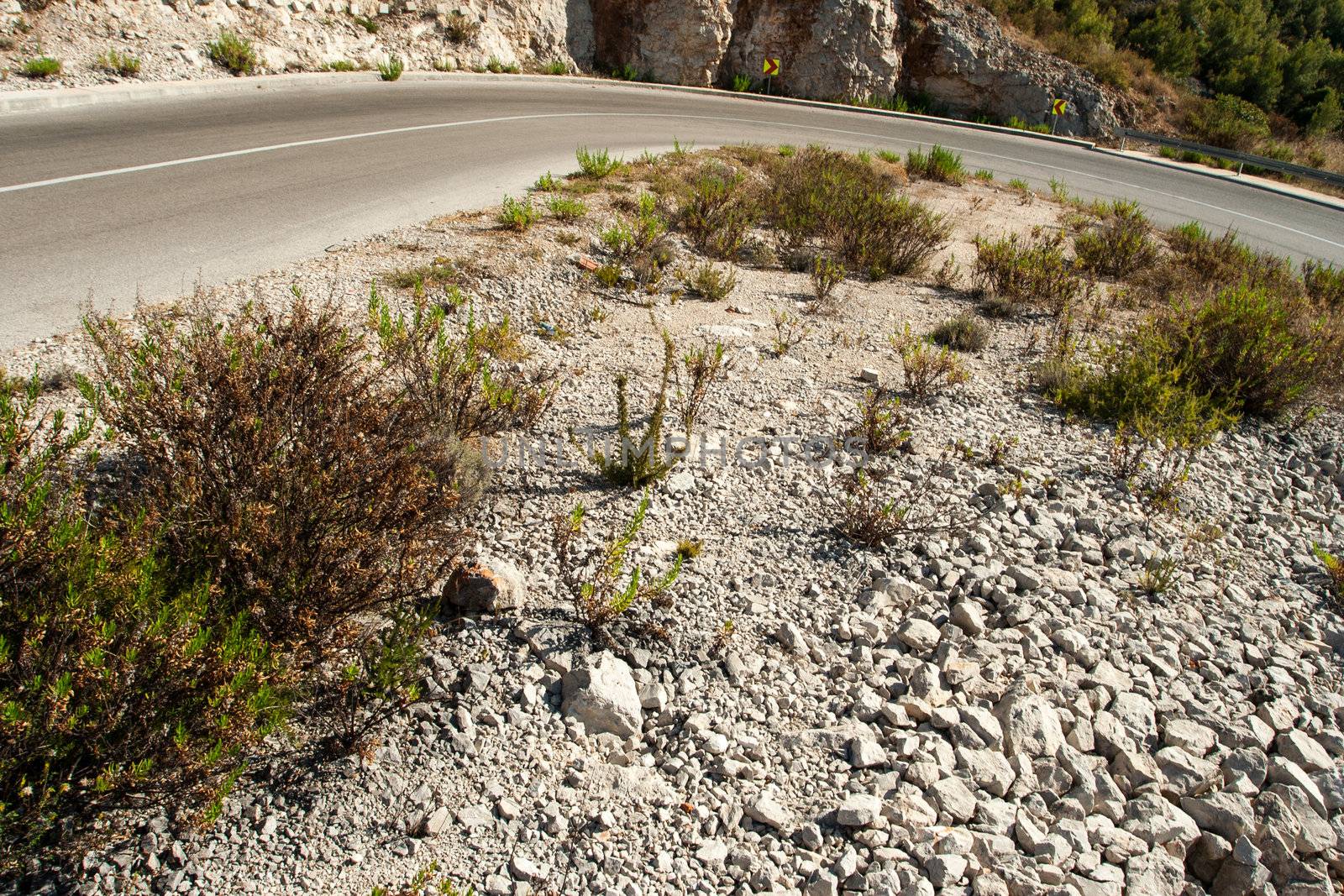 winding road in deserted landscape in vis island