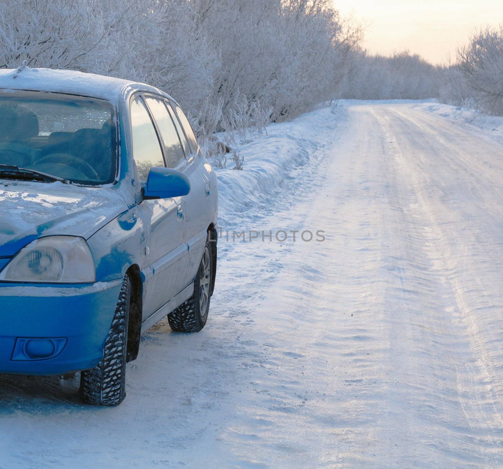 Snowy road surface from  car.Snowy country lane.winter freeway