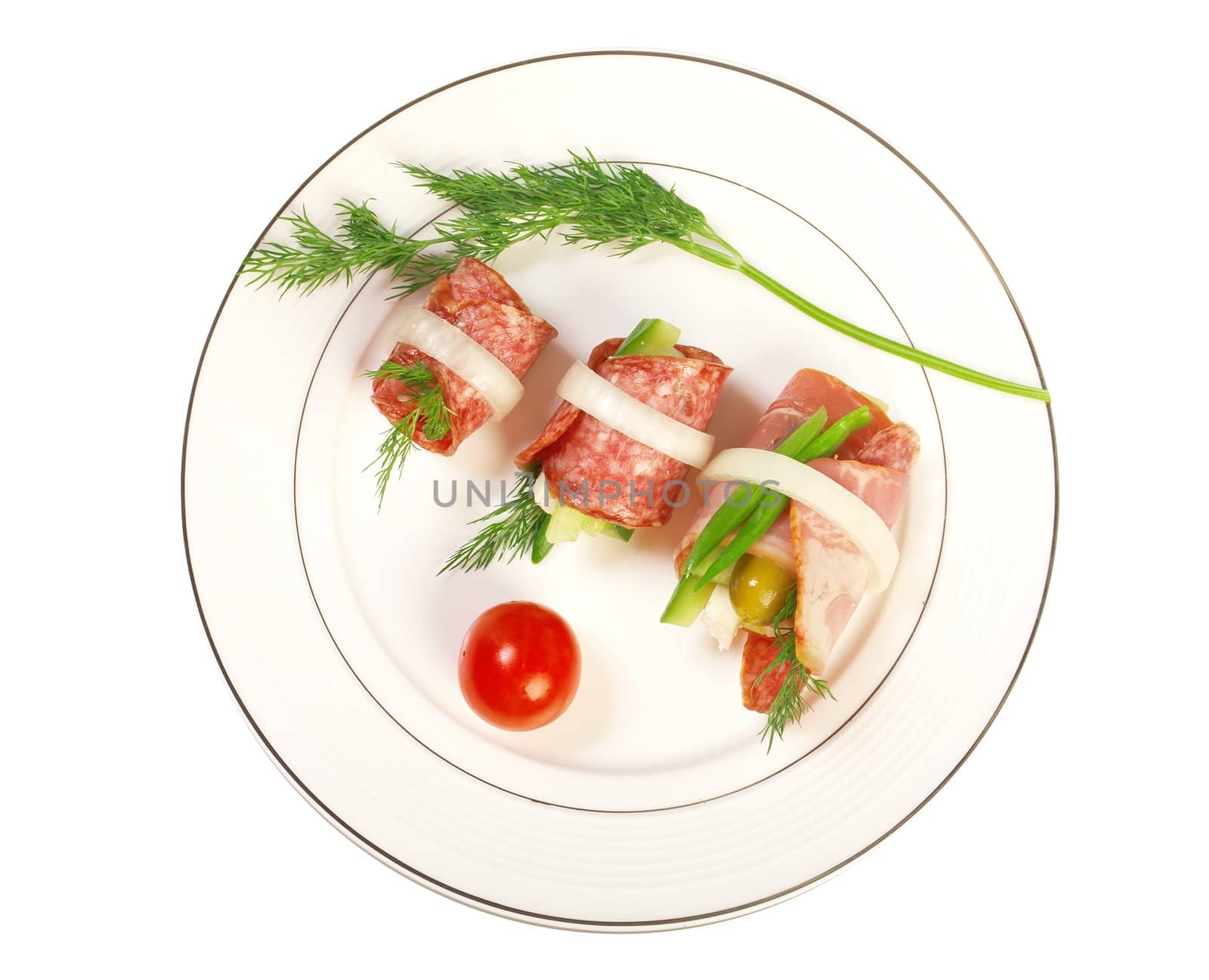 Canape platter with cheese, smoked sausage,cucumber,onion . Shallow depth-of-field. 