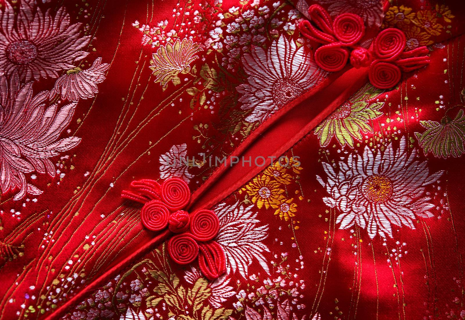 Traditional Chinese Red knot buttons on Cheongsam silk dress details 