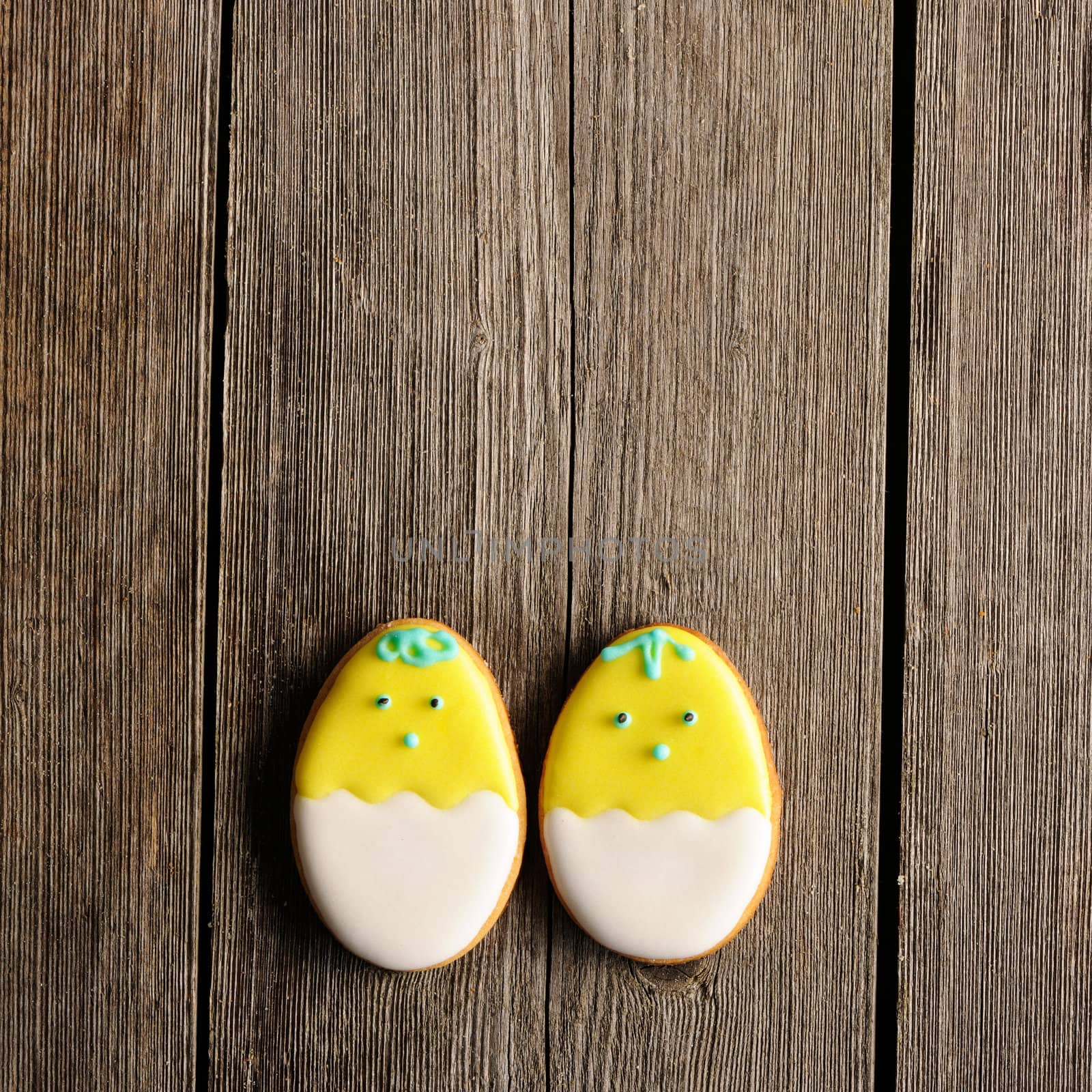 Easter homemade gingerbread cookie over wooden table