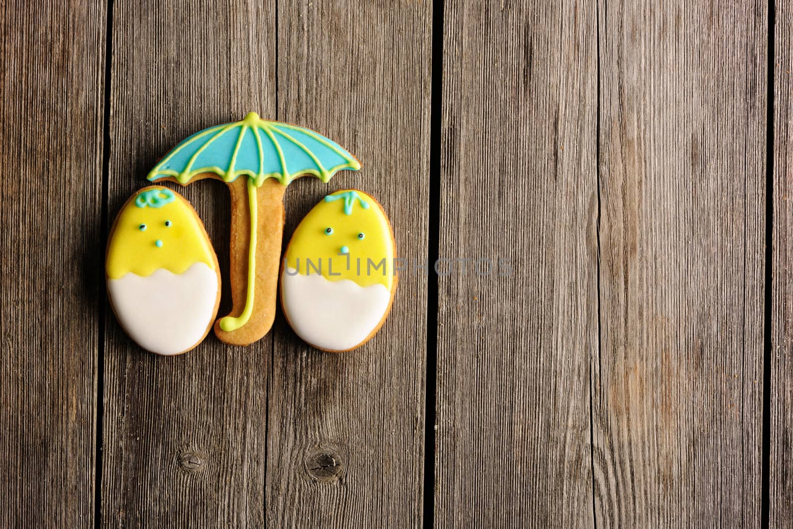 Easter homemade gingerbread cookie over wooden table