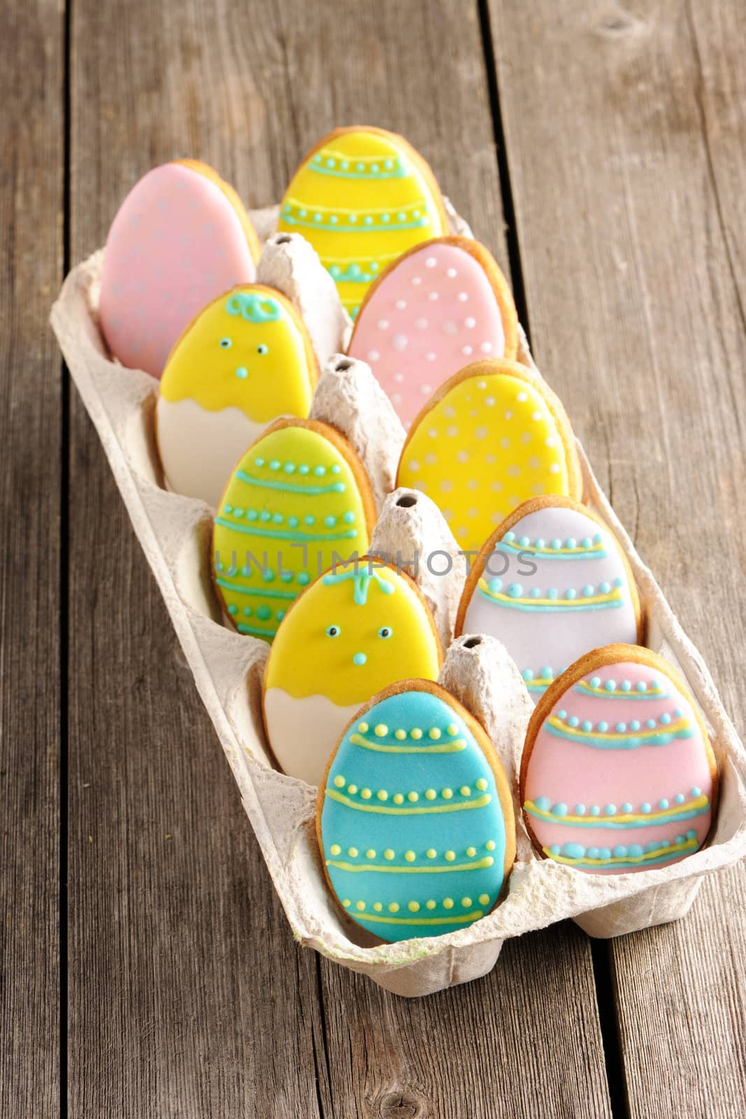 Easter homemade gingerbread cookie over wooden table