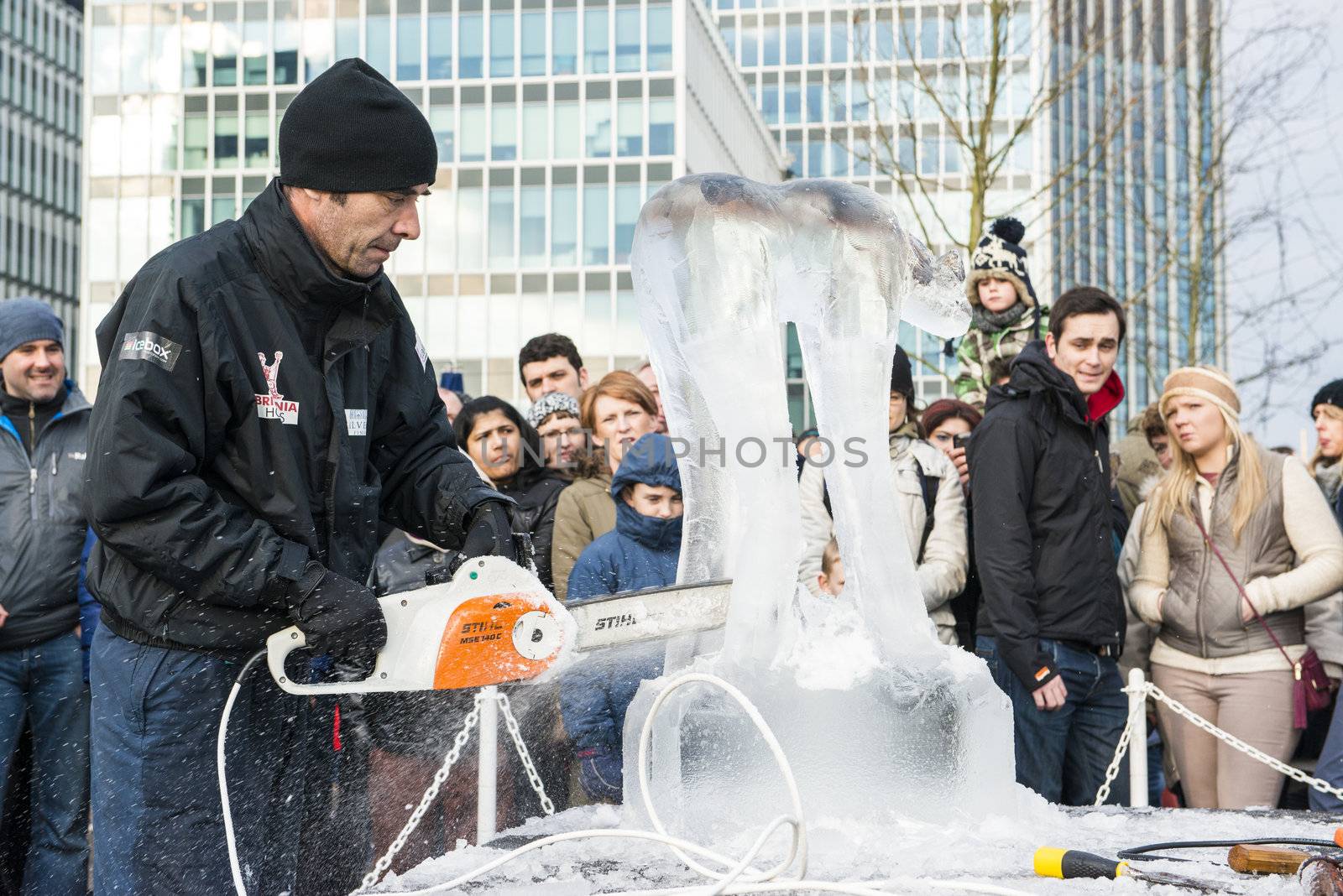 LONDON, UK - JANUARY 13: Artists compete in the freestyle category at the London Ice Sculpture Festival, in Canary Wharf. January 13, 2013 in London.