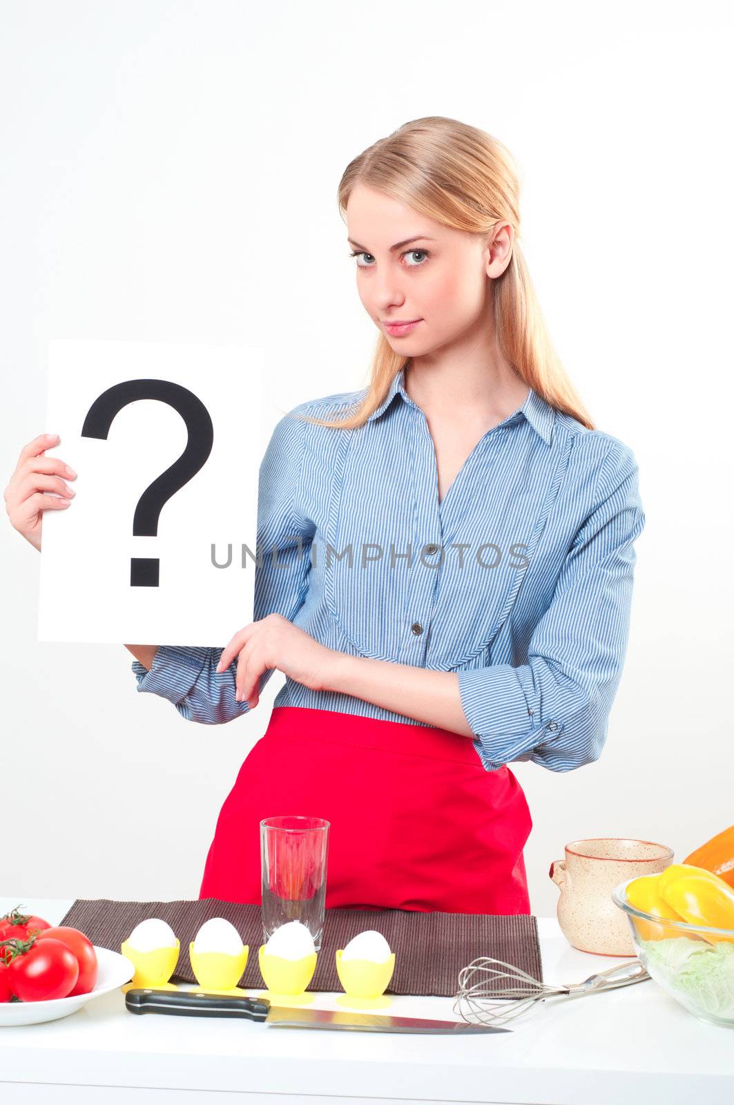 woman holding a plate with question mark