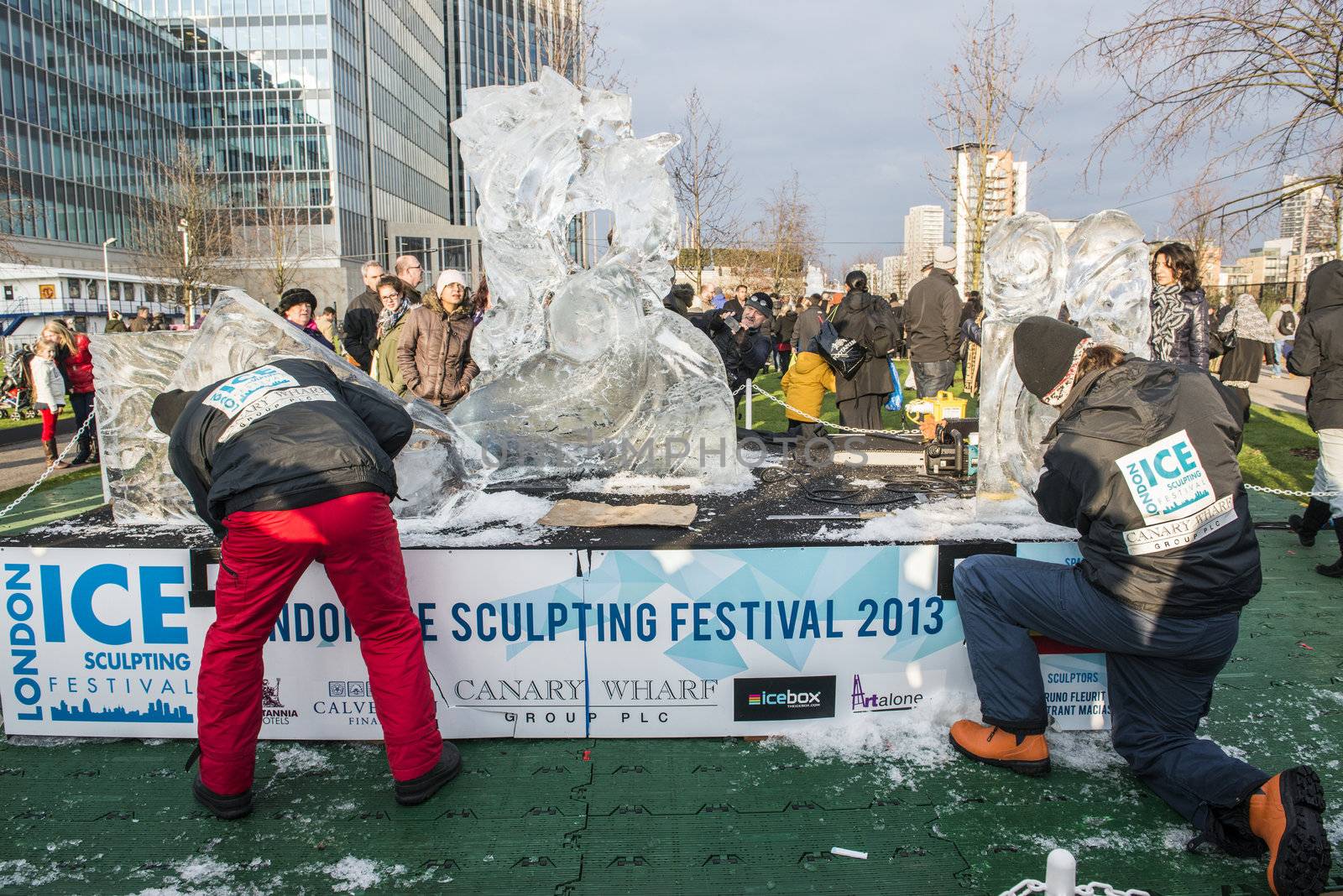 LONDON, UK - JANUARY 13: Artists compete in the freestyle category at the London Ice Sculpture Festival, in Canary Wharf. January 13, 2013 in London.