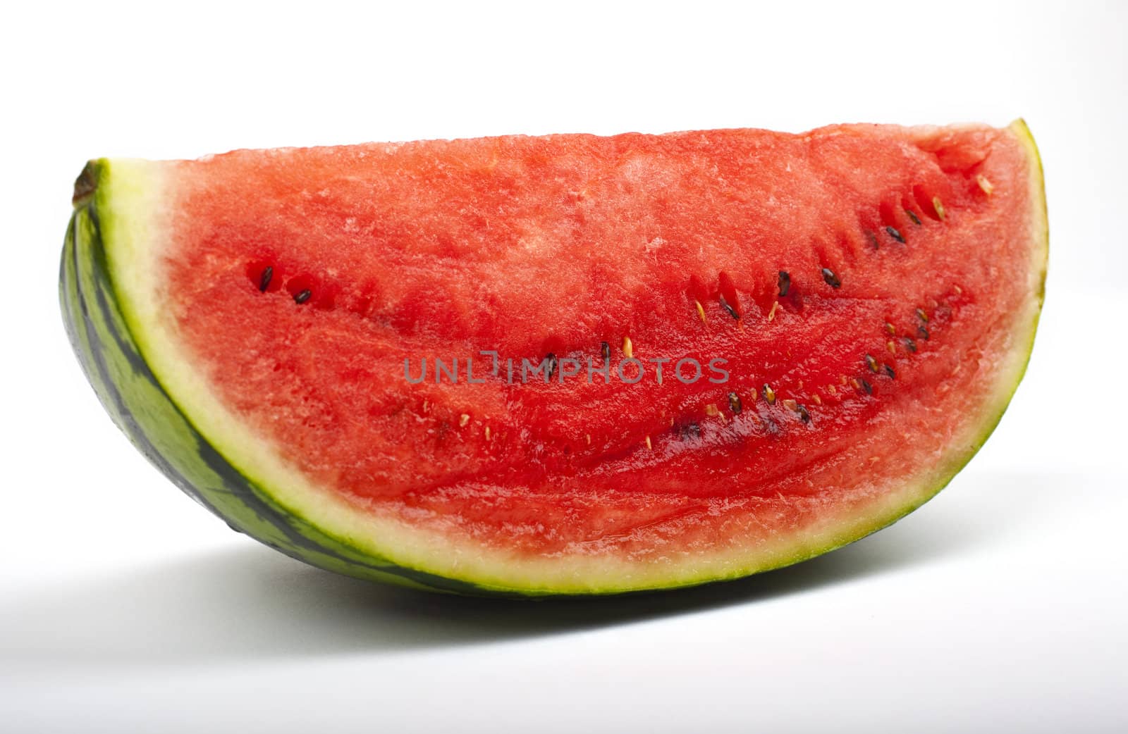 A slice of Watermelon over a white background.