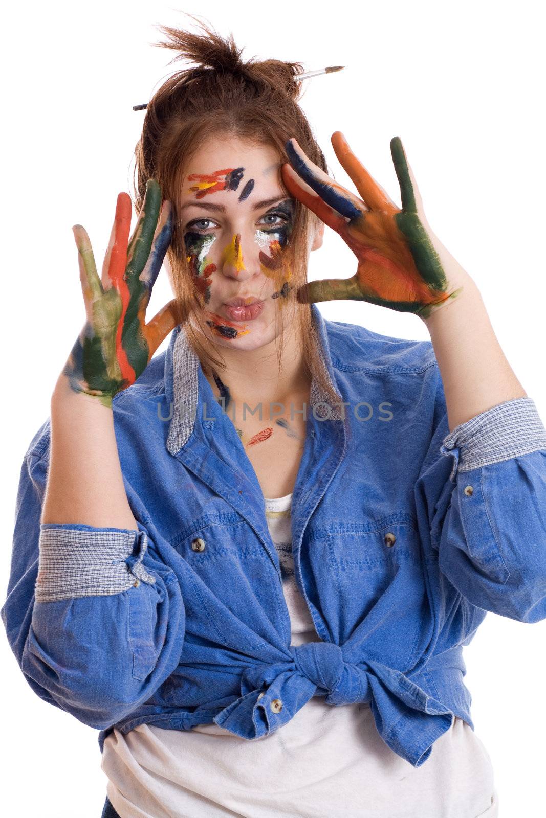 Happy woman with paint smeared hands isolated